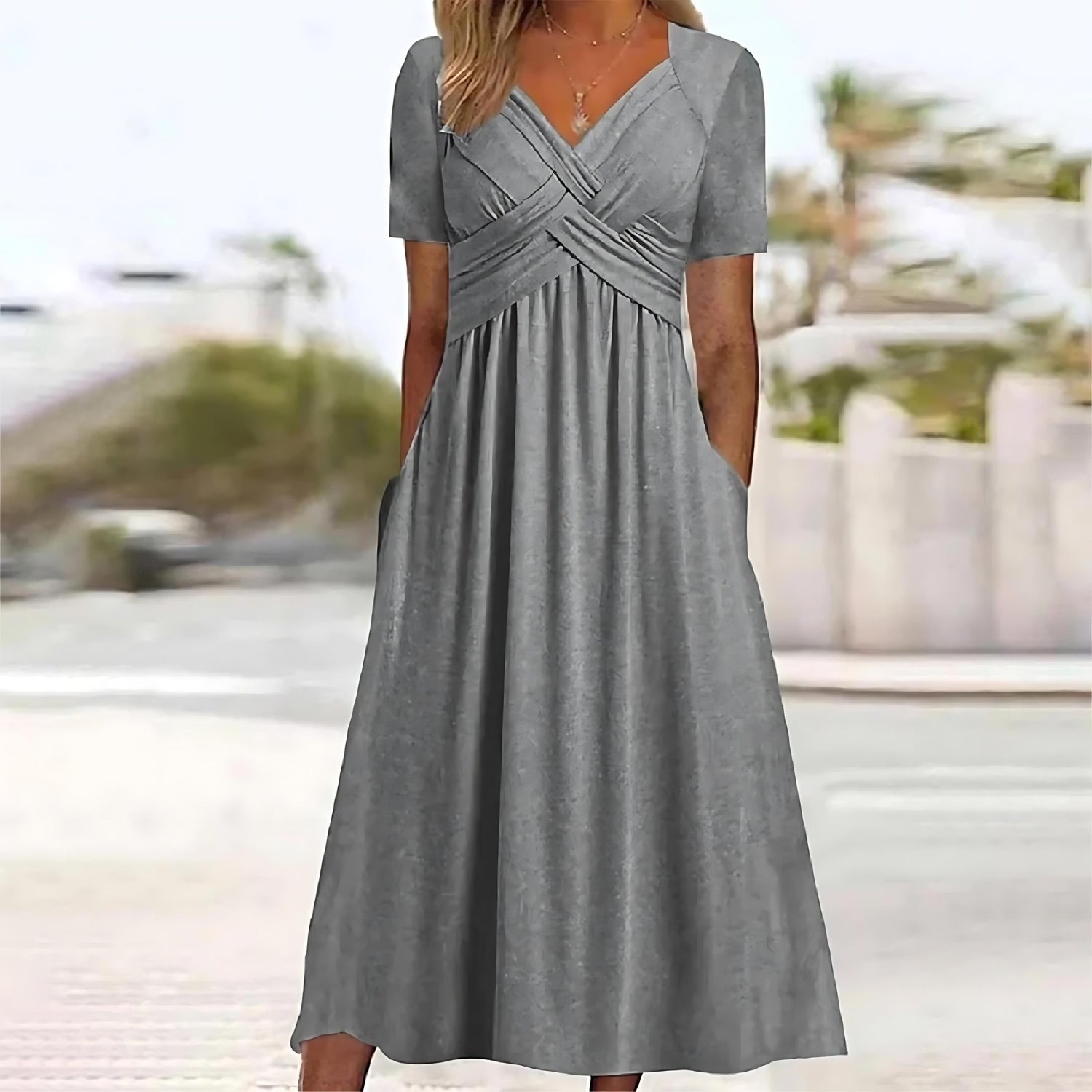 Inez | Mouwloze midi jurk