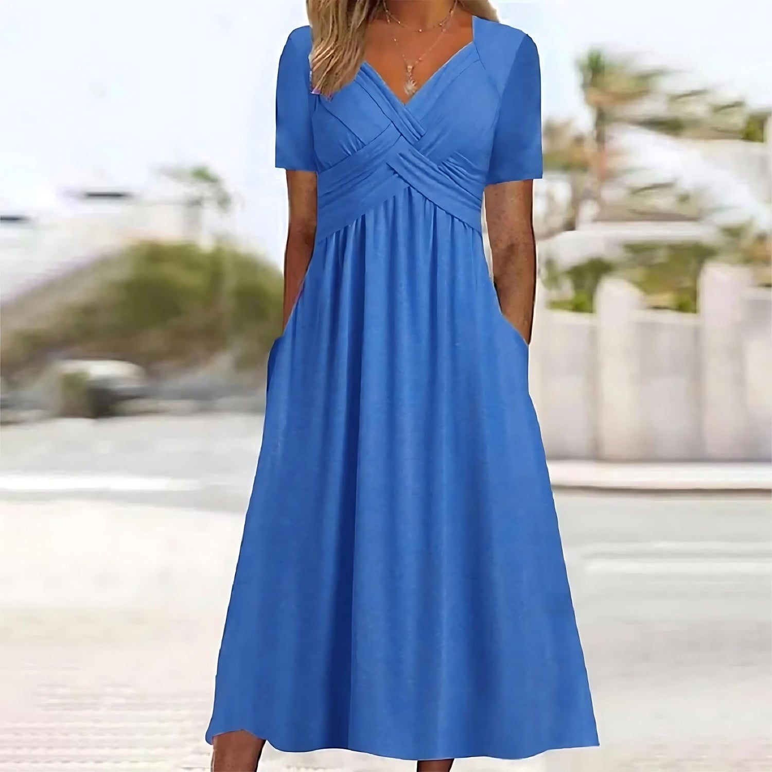 Inez | Mouwloze midi jurk