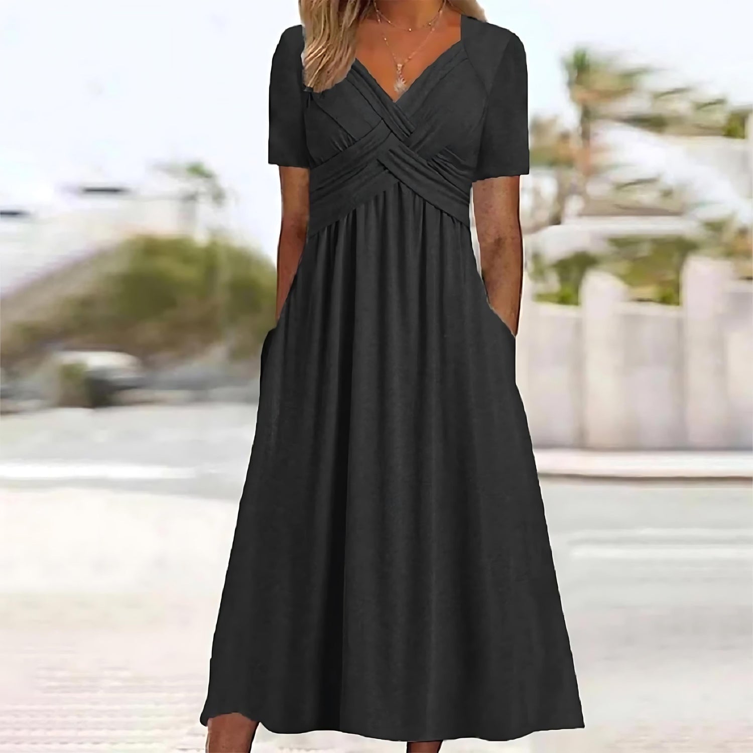 Inez | Mouwloze midi jurk